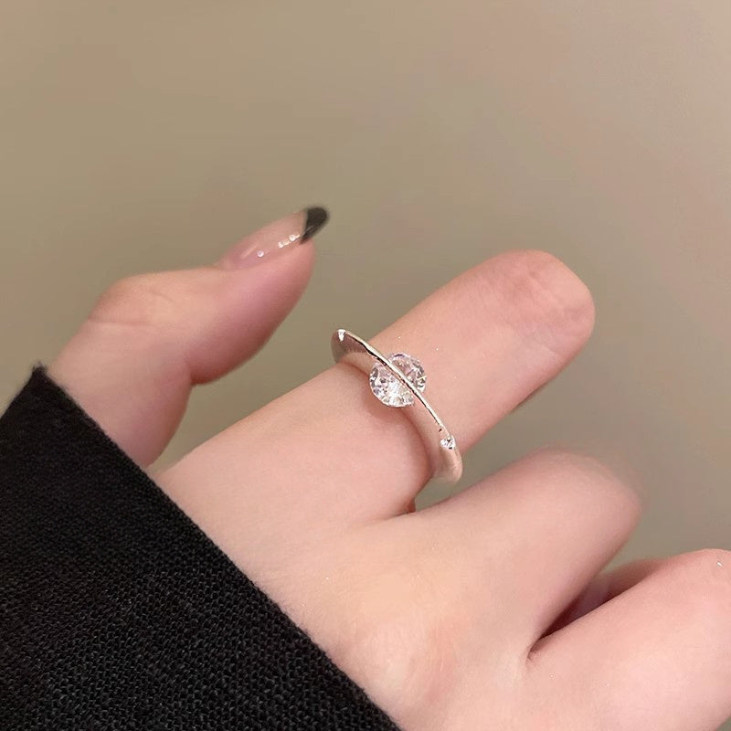 Rotating Zirconia Planet Surrounds Zirconia Ring, Exuding a Fashionable And High-End Vibe for Women. Finger Ring Is Fashionable, Simple, And Niche in Design