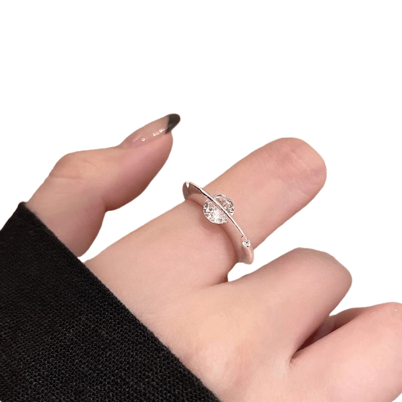 Rotating Zirconia Planet Surrounds Zirconia Ring, Exuding a Fashionable And High-End Vibe for Women. Finger Ring Is Fashionable, Simple, And Niche in Design