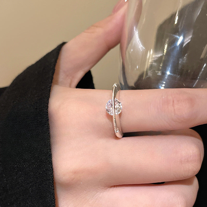 Rotating Zirconia Planet Surrounds Zirconia Ring, Exuding a Fashionable And High-End Vibe for Women. Finger Ring Is Fashionable, Simple, And Niche in Design
